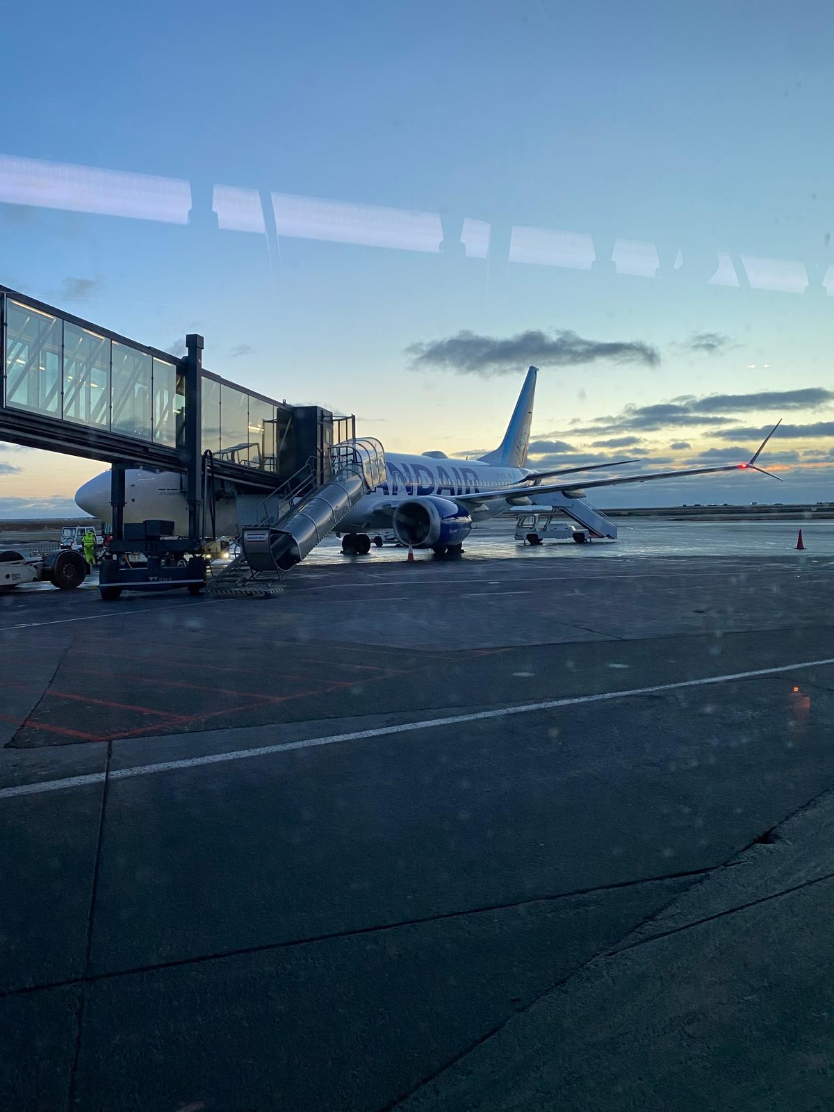 Icelandair plane at Keflavik airport at dawn